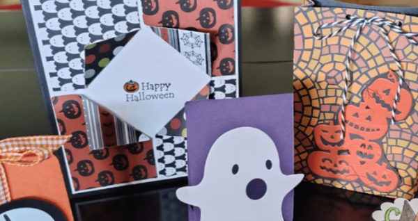 Bootiful Halloween Crafts workshop featuring handmade holiday cards and colorful candy bags.